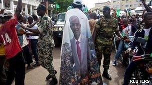 Guinean police patrol the streets of Conakry during a rally. Photo: 19 October 2010