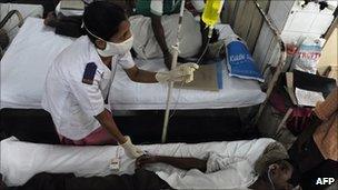 A patient receives malaria treatment in a hospital in Mumbai