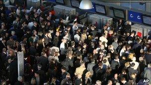 Passengers wait for flights at Nice airport, southern France