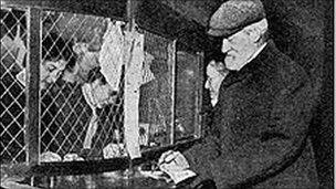 A man collects his first pension from a Post Office in January 1909