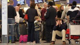 Passengers at a busy airport