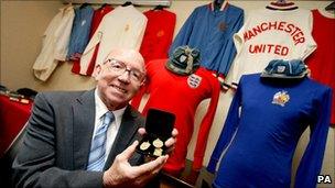 Nobby Stiles with his football memorabilia