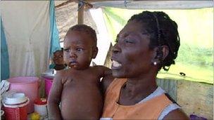 Earthquake victim Bierneme and her baby