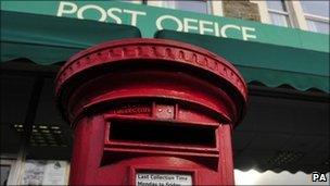 Postbox outside a Post Office branch