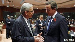 Luxembourg PM Jean-Claude Juncker (left) with UK Prime Minister David Cameron at summit, 28 Oct 10