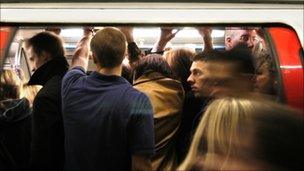 People on a tube train