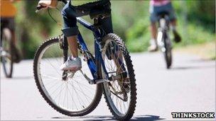 Stock image of children on bicycles