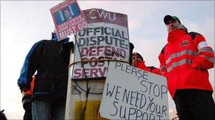 Royal Mail staff in a picket line