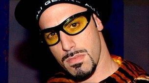 Sacha Baron Cohen as Ali G