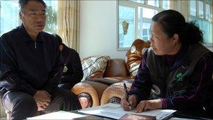 Census worker Liu Liying collects information in Erhe village on 1 November 2010