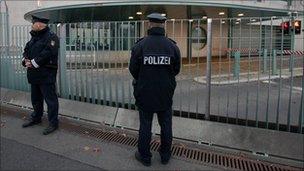 German police guard the main gate of the Chancellery in Berlin after the "suspicious package" was found - 2 November 2010