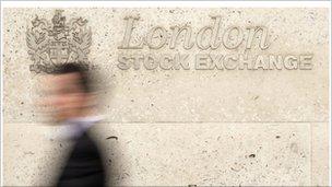 Man walks past London Stock Exchange