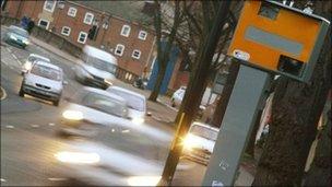 Speed camera with passing cars