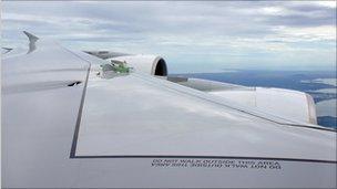 Qantas A380 plane in flight with hole in its wing, 4 November 2010