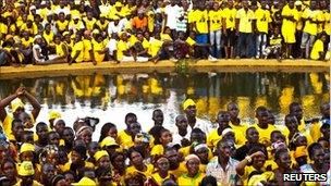 Supporters of presidential candidate Alpha Conde attend a campaign rally in Conakry on 22 October 2010