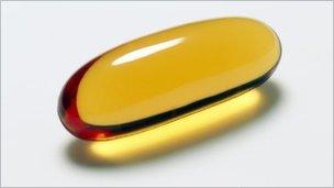 A vitamin E capsule