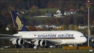 A Singapore Airlines A380 has its engine checked in Zurich, Switzerland, 4 November
