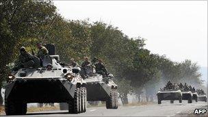 A column of Russian armoured vehicles travel on the Gori-Tbilisi road 22 August 2008