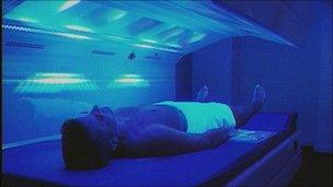 Man on sunbed (archive image)