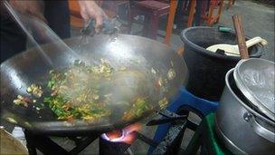 Deri was busy cooking nasi goreng at the Jalan Sabang hawker centre