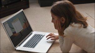 Child using a laptop