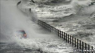 A car is engulfed by water in Saltcoats, North Ayrshire, on 11 November 2010.