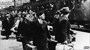 Foreign Jews travel through a station in Pithviers, central France (May 1941)