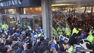 Protesters and police face each other during the violence