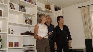 Estate agent viewing house