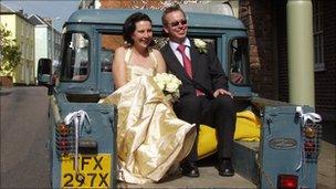 Married couple seated on a truck. Photo: Richard Snow