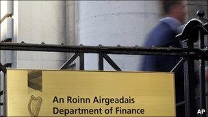 A worker enters the Department of Finance in Dublin