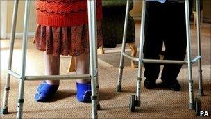 Two women with zimmer frames