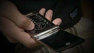 person holding mobile phone