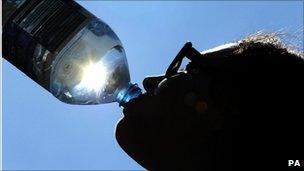 Man drinking bottled water