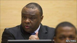 Jean-Pierre Bemba speaks at the opening of his trial