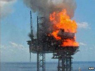 Handout photo provided by PTTEP Australasia shows fire on the West Atlas drilling rig