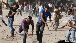 Christian demonstrators throw stones at police in Cairo - 24 November 2010