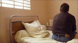 Psychiatric patient waiting in a ward