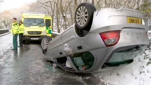 Overturned car at Machynlleth, Powys