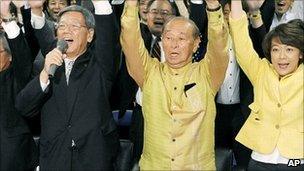 Governor Hirokazu Nakaima celebrates in Naha, Okinawa (28 Nov 2010)