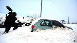 Car buried in snow in Northumberland