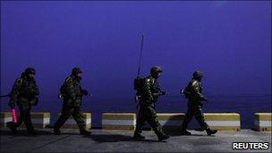 South Korean marines patrol on Yeonpyeong Island, which was shelled by North Korea last week