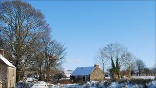 Ruined cottage in snow