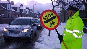 Lollipop man at Ashley Road School in Aberdeen