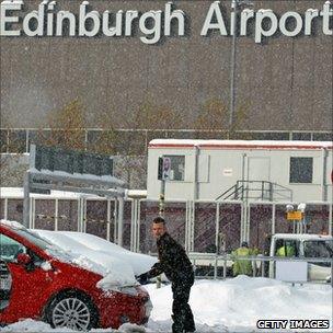 Man digs car out at Edinburgh Airport