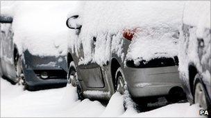 Cars covered in snow near Ashford in Kent