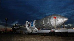 Russian Proton-M rocket carrying the three Glonass satellites is carried to the launch pad - 2 December 2010