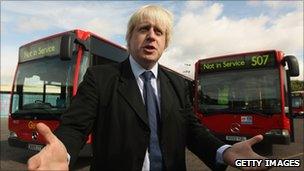 Boris Johnson and two buses