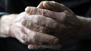 Hands of elderly person