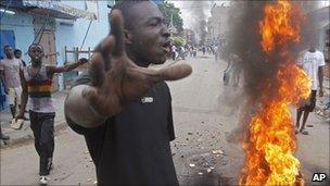 Supporters of Ivory Coast opposition leader Alassane Ouattara protest, 06/12